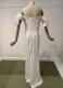 White crepe gown with sculptural bows/38-40