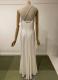 White sleeveless gown/36-38