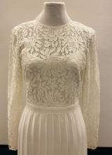 White pleated dress with lace
